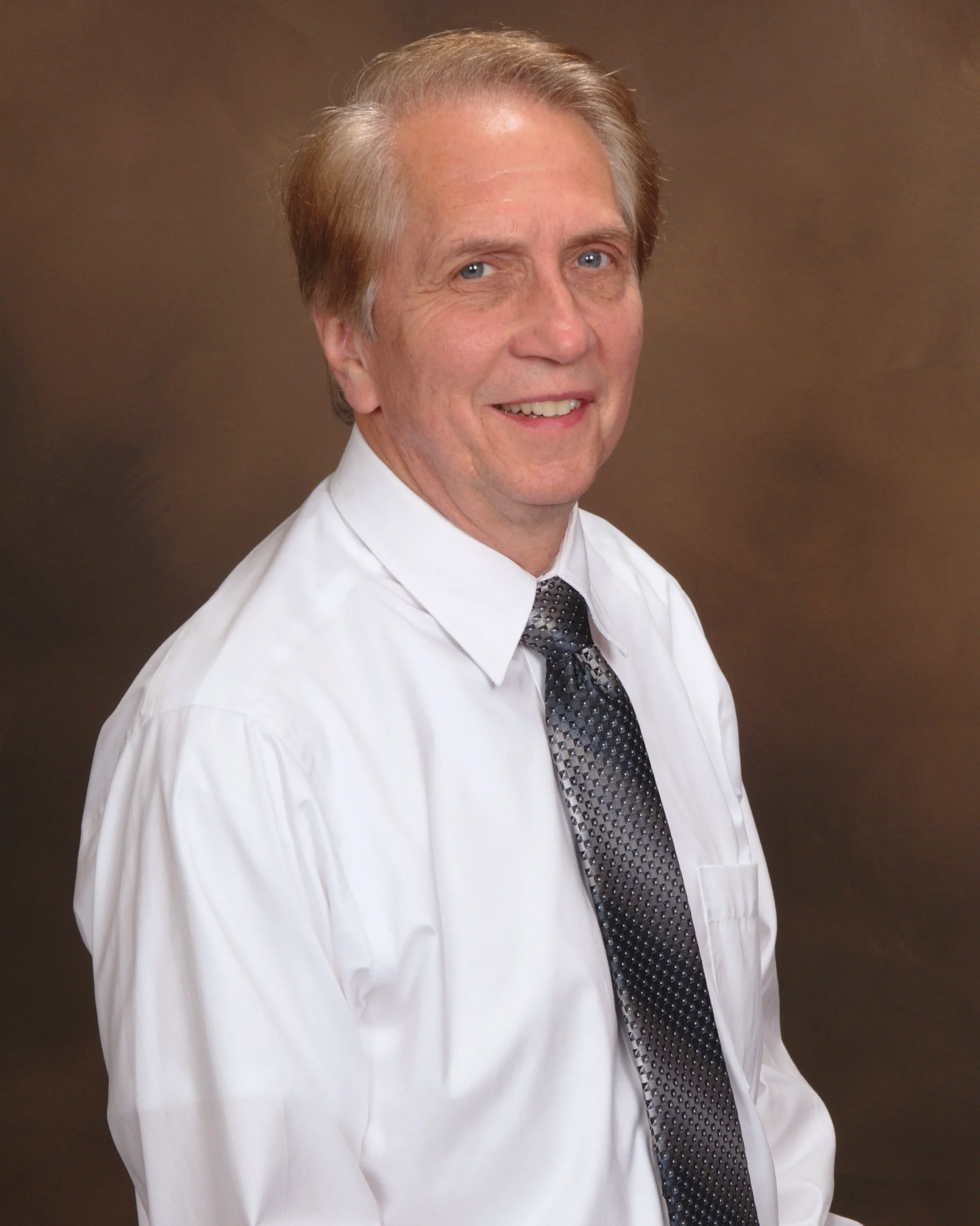 Dr. Thomas J. Kronholz, D.D.S.